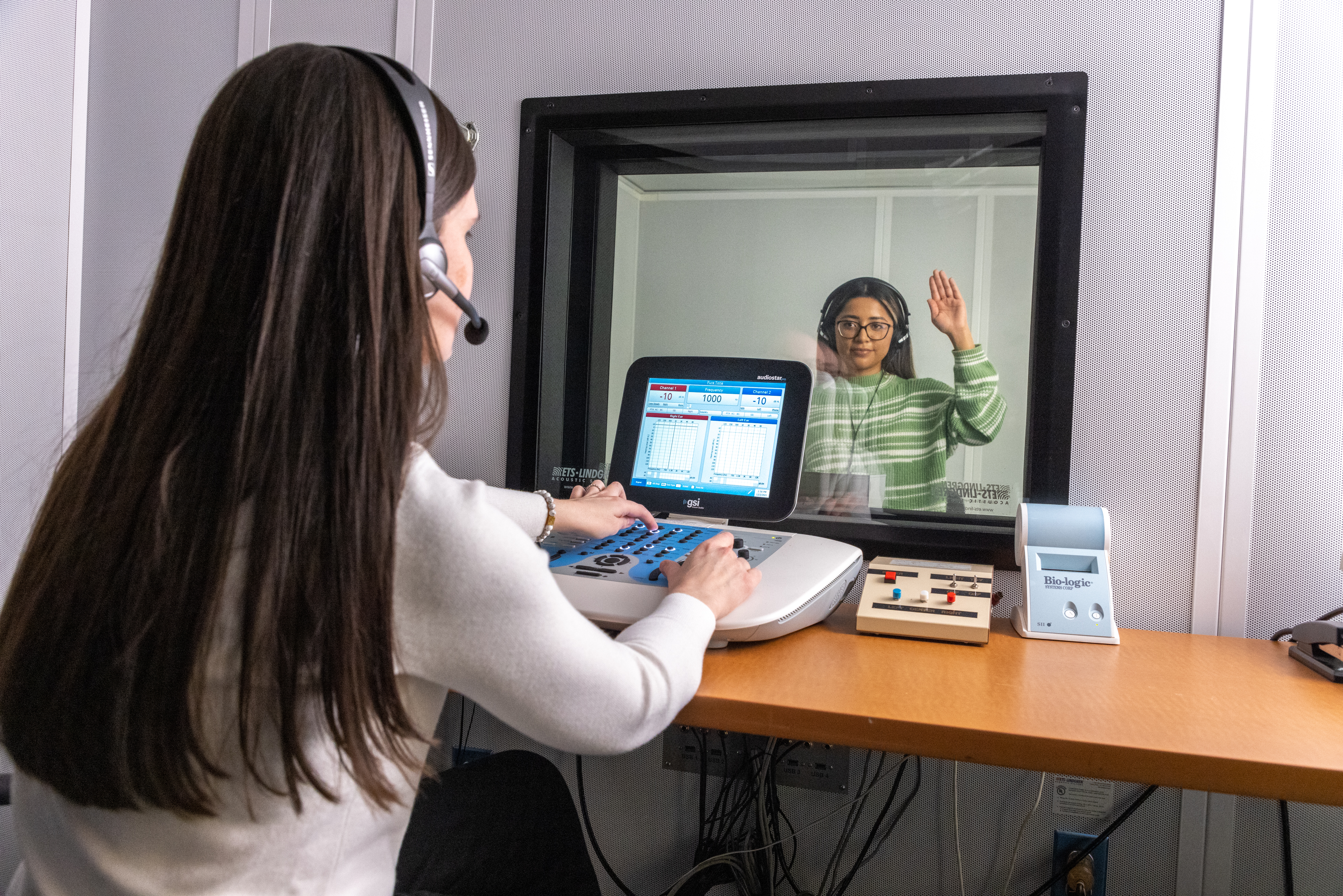 Speech-Language Pathology student working in a clinical setting