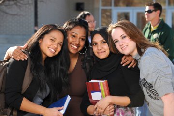 Group of smiling Mercy students