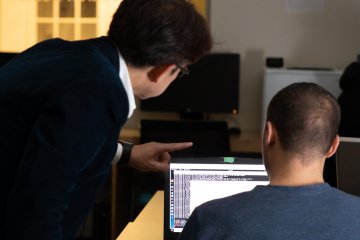 instructional designer helping student