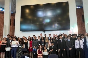 2024 Summer Leadership Academy participants pose in the Rotunda at Mercy University's Westchester Campus