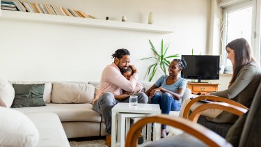 A family therapist helps bring a family together.