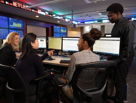 Mercy College Business students in the Wall Street style trading room.