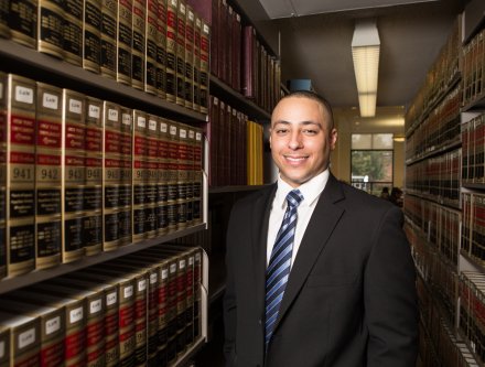 A Legal Studies student in the Mercy College Library (Legal Section).