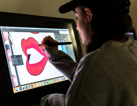 student creating digital art