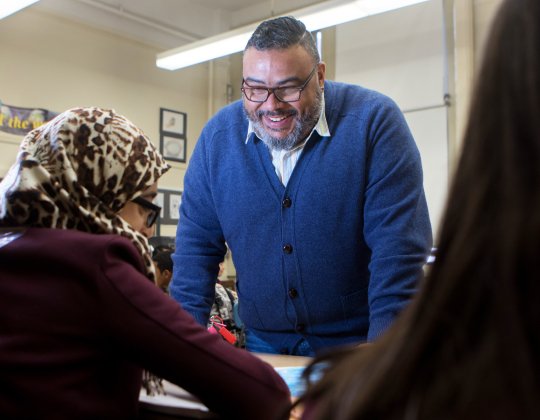 teacher engaged with students