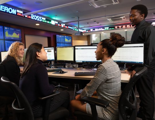 business students in the trading room